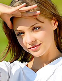 Amelie is a pretty teen. She is at the field now